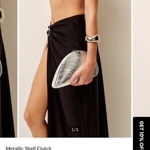 Commense Silver Clamshell clutch